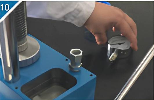 10. Remove the pointer pressure gauge.