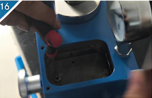 16. Use a thin plate to push open the ball of the one-way valve and shake the pressure handle to release the gas.