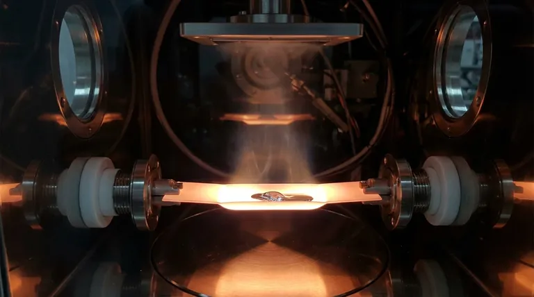 Como é feita a vaporização da fonte na evaporação térmica do PVD? O Papel do Aquecimento Resistivo e do Vácuo