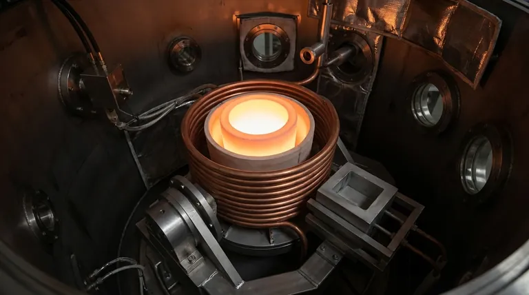 Quels sont les composants clés à l'intérieur de la chambre à vide d'un four de fusion par induction sous vide ? Un guide de l'ensemble de fusion central