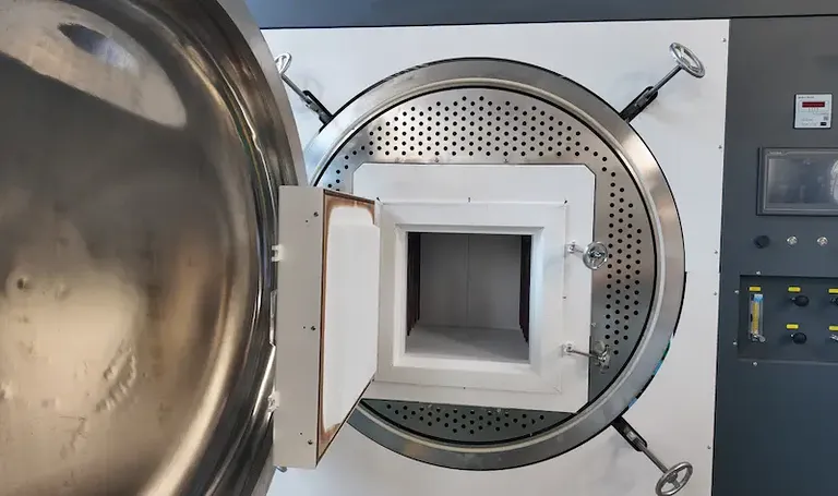 Inside the chamber of a vacuum melting furnace
